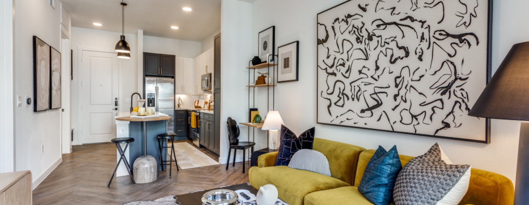 living room area with a connected kitchen