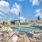 pool with reclining seats and nearness to apartments