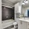 bathroom with a large mirror